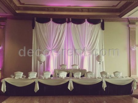 Dark plum and white elegant wedding backdrop.