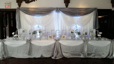 Silver, white wedding backdrop and head table setting. Toronto.