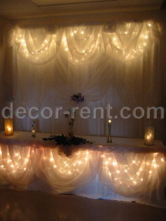 Wedding backdrops in white and champagne organza. Toronto.