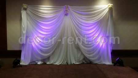 White sheer backdrop with flower accents. Toronto.